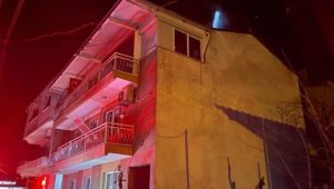 Kemalpaşa'da bir binada çıkan yangın hasara neden oldu