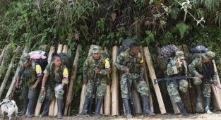 Kolombiya'da FARC'ın yaklaşık 18 bin çocuğu silah altına aldığı ortaya çıktı
