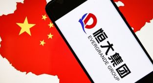 Çin'in borç krizindeki şirketi Evergrande, emlak yönetim biriminin çoğunluk hissesini satıyor
